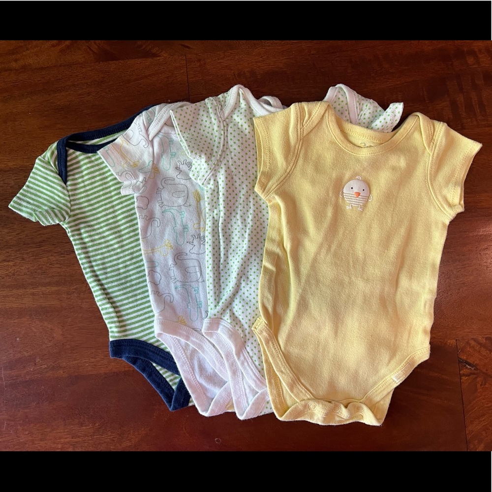 Four onesies, size 0-3 months